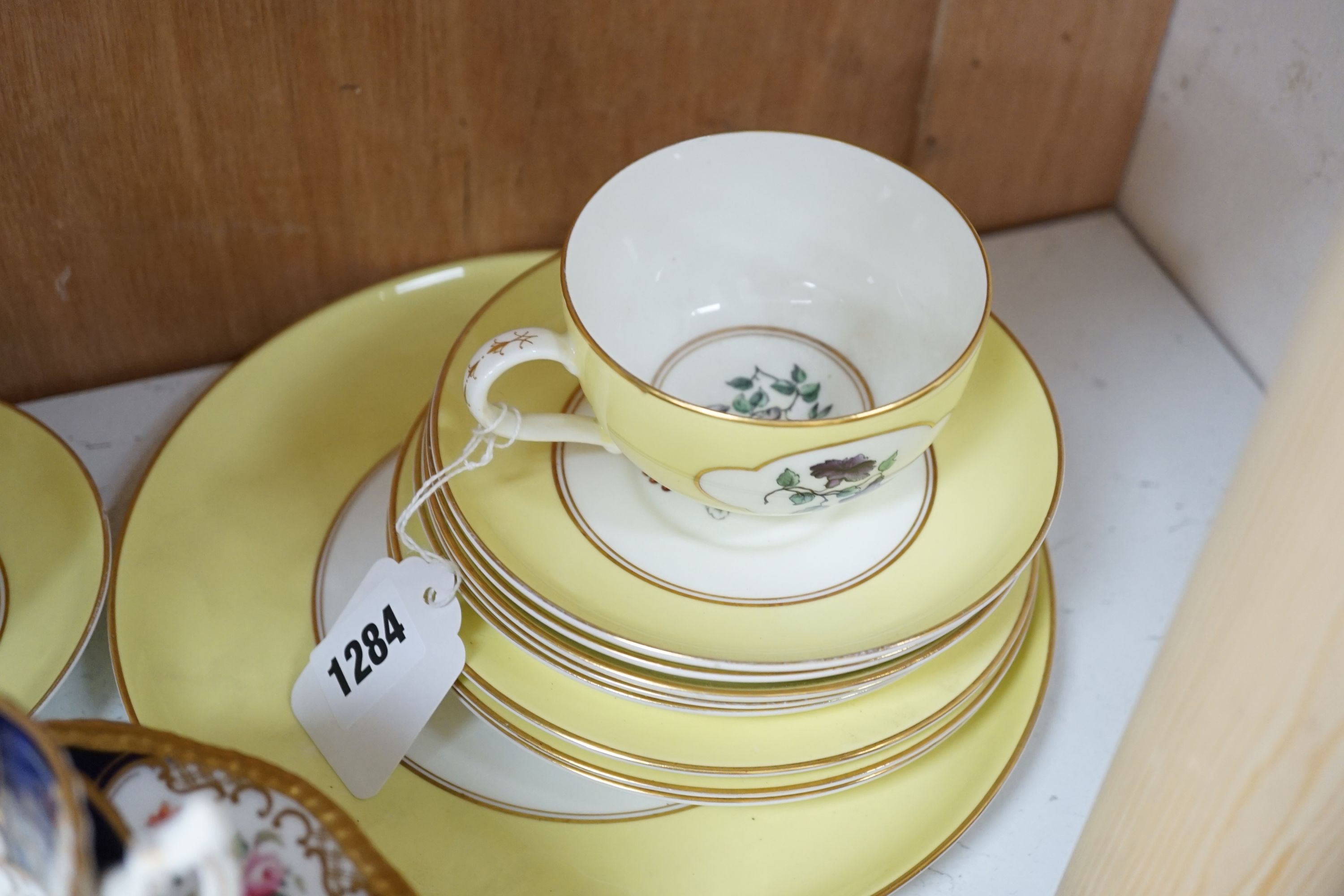 Royal Worcester for Aspreys - a set of six flower painted cups and saucers and four sideplates together with a Coalport part tea set